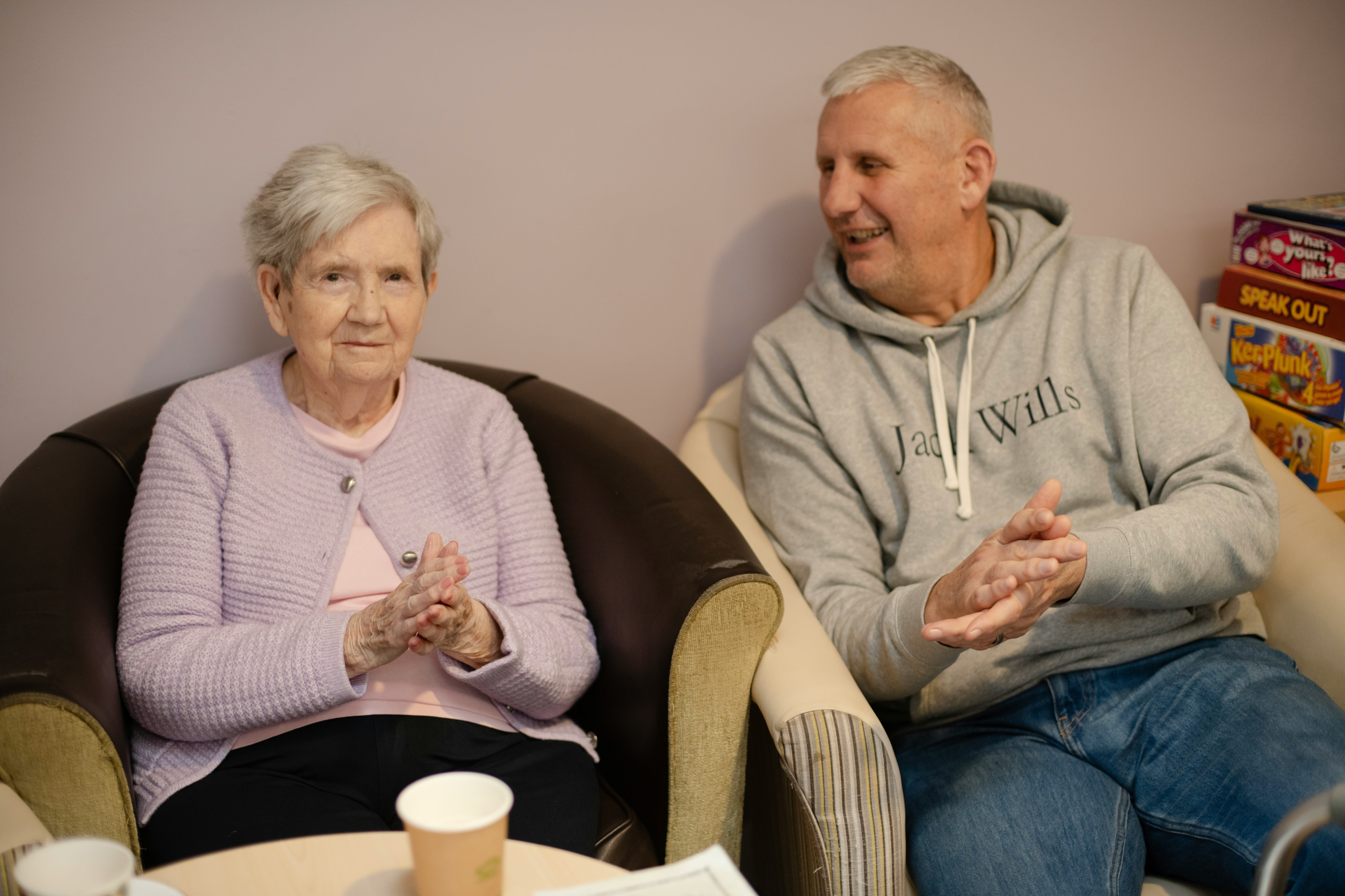 Elderly man and woman chatting
